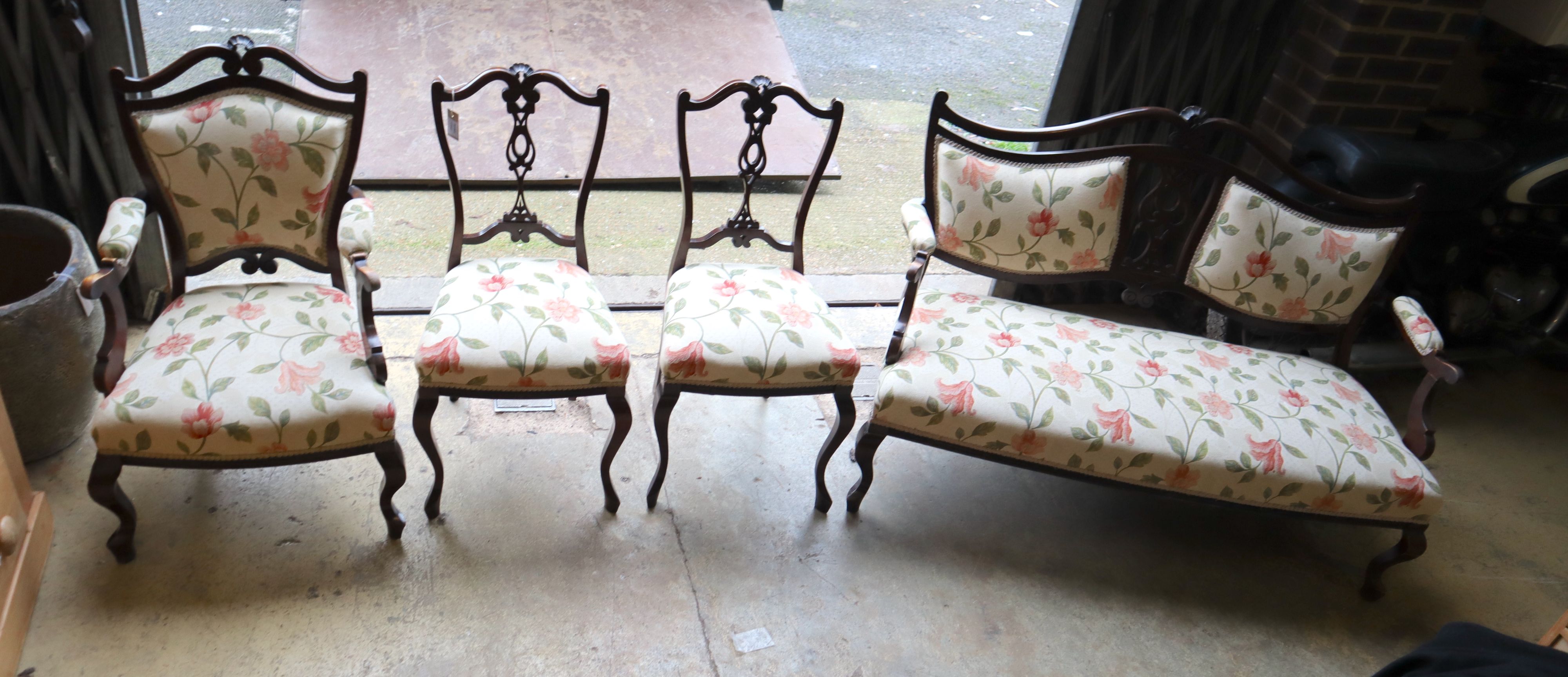 A late Victorian upholstered four piece salon suite, settee 133cm wide, 87cm high